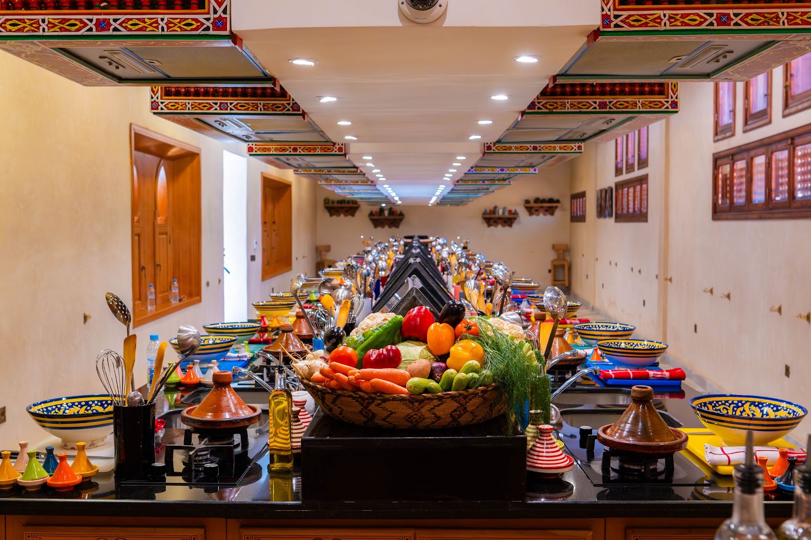 Cours de cuisine marocaine avec tajine en préparation